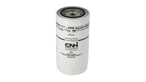 Fuel filter for New Holland diesel engines. Removes water and particulate contaminants to protect injection systems.